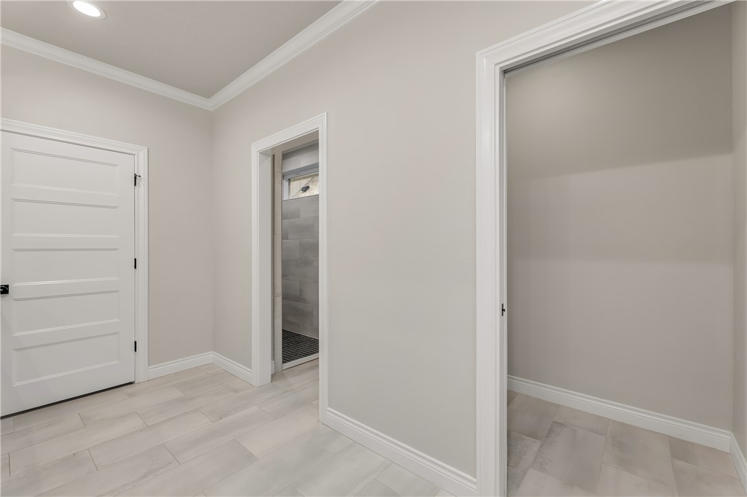 1736 Blanco Bend Drive College Station, TX 77845 - Photo 23 of 36 wooden floor and closet in a room