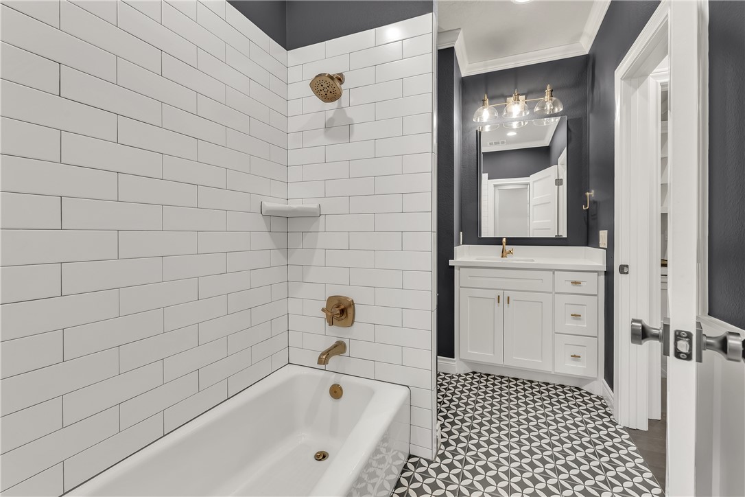 1736 Blanco Bend Drive College Station, TX 77845 - Photo 26 of 36 a bathroom with a bathtub and a shower