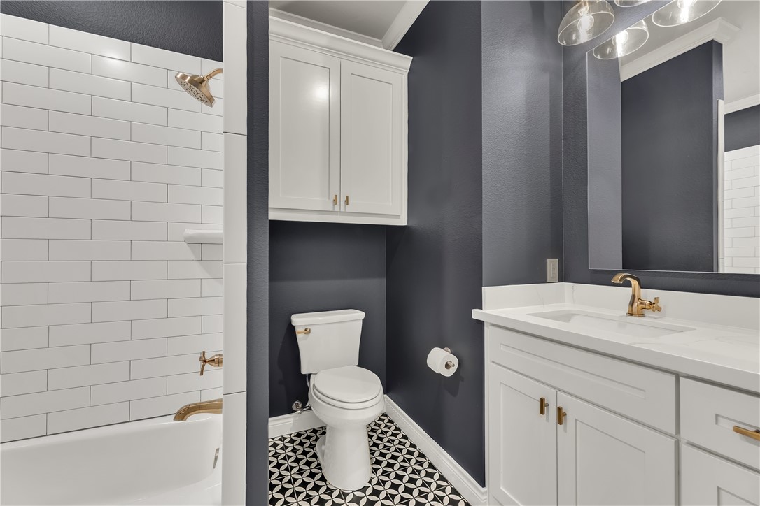 1736 Blanco Bend Drive College Station, TX 77845 - Photo 27 of 36 a bathroom with a sink toilet and shower