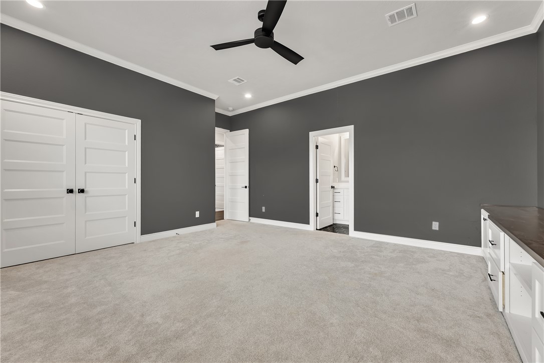 1736 Blanco Bend Drive College Station, TX 77845 - Photo 31 of 36 a view of an empty room with a ceiling fan
