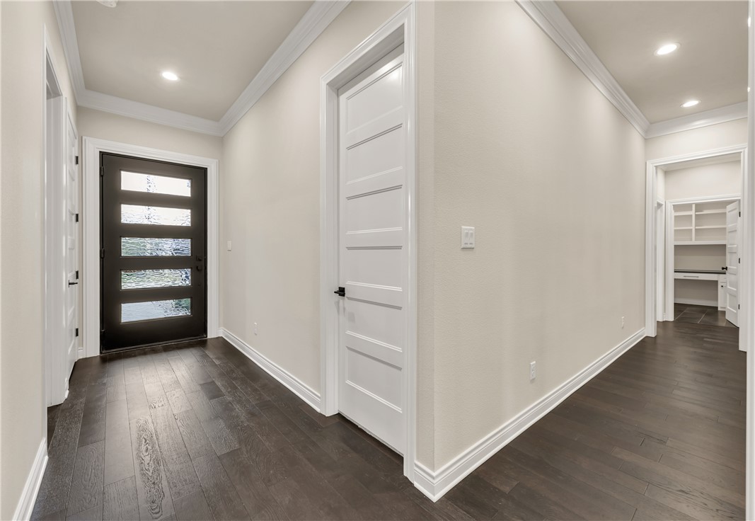 1736 Blanco Bend Drive College Station, TX 77845 - Photo 9 of 36 an empty room with wooden floor closet and windows