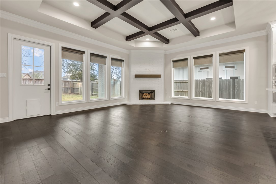 1736 Blanco Bend Drive College Station, TX 77845 - Photo 10 of 36 a view of an empty room with wooden floor and a window