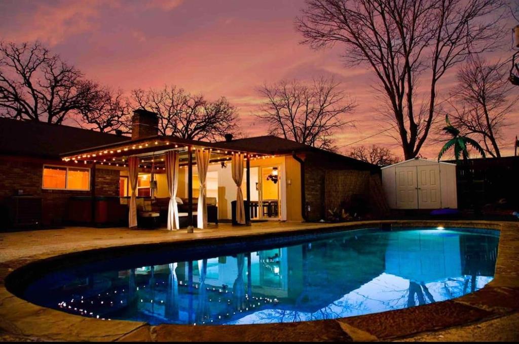 2404 Crestview Circle Irving, TX 75062 - Photo 3 of 39 a view of a swimming pool with a patio