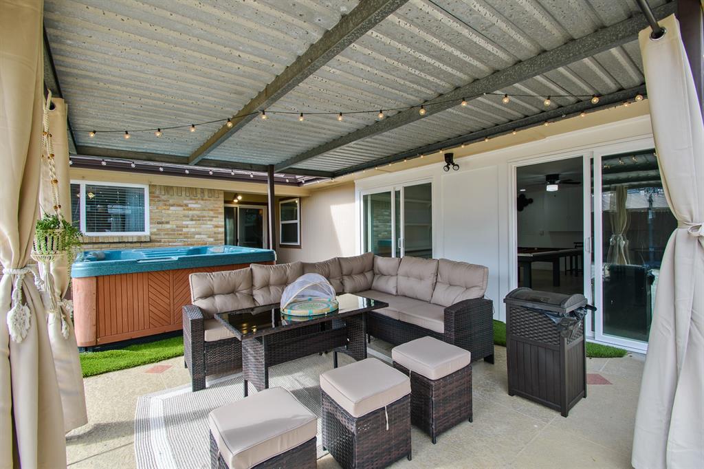 2404 Crestview Circle Irving, TX 75062 - Photo 31 of 39 a balcony with furniture and a table