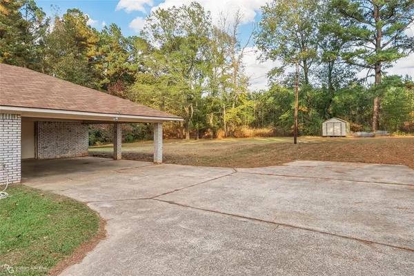 front view of a house with a garden