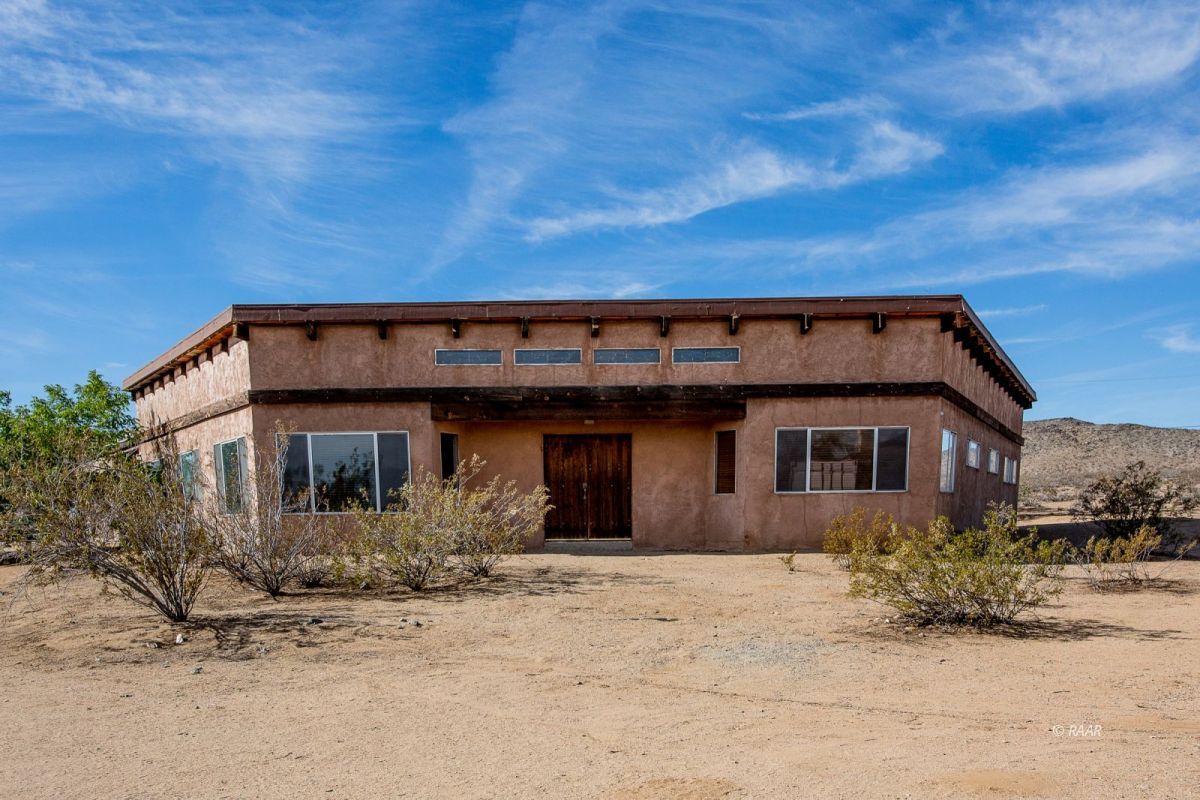 2055 South Garth Street Ridgecrest, CA 93555 - Photo 1 of 1 a view of a house with a yard