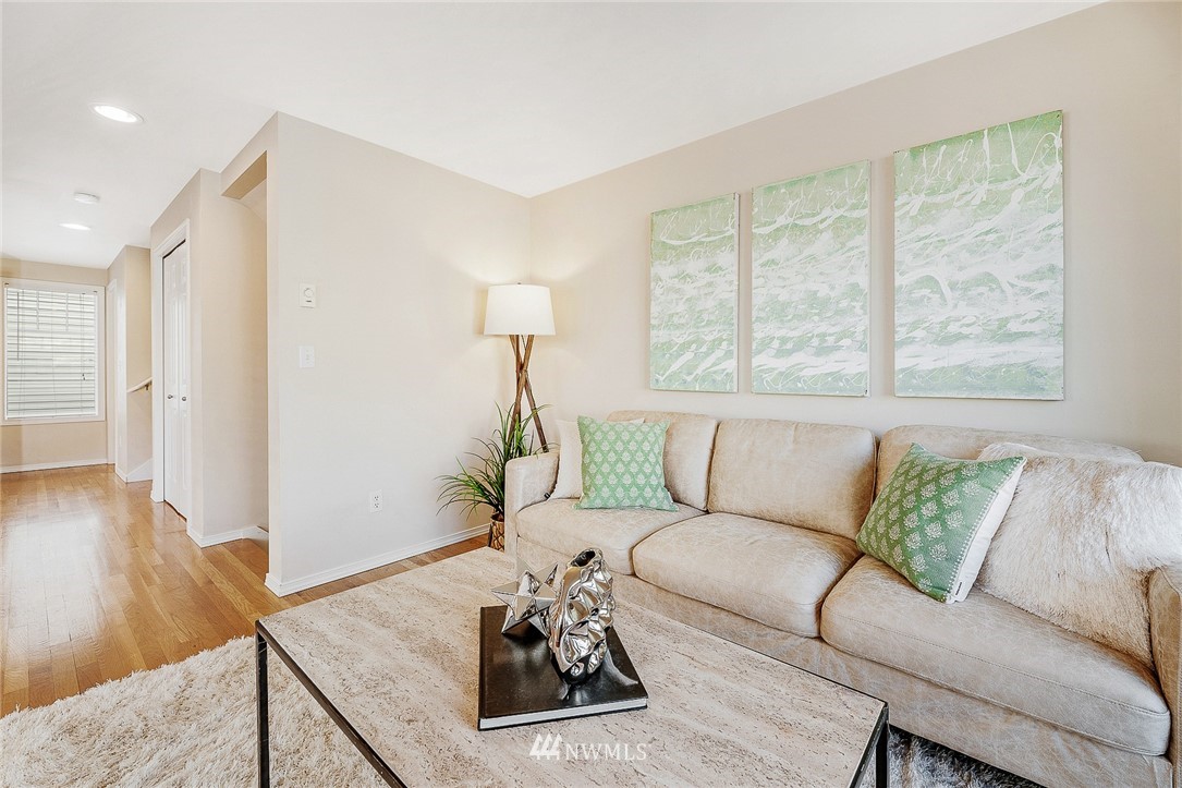 8542 B Midvale Avenue North Seattle, WA 98103 - Photo 3 of 31 a living room with furniture and wooden floor