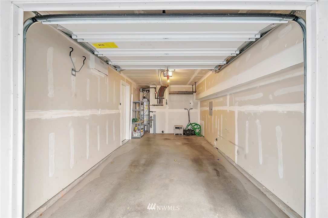 8542 B Midvale Avenue North Seattle, WA 98103 - Photo 31 of 31 a view of a hallway with wooden floor and staircase