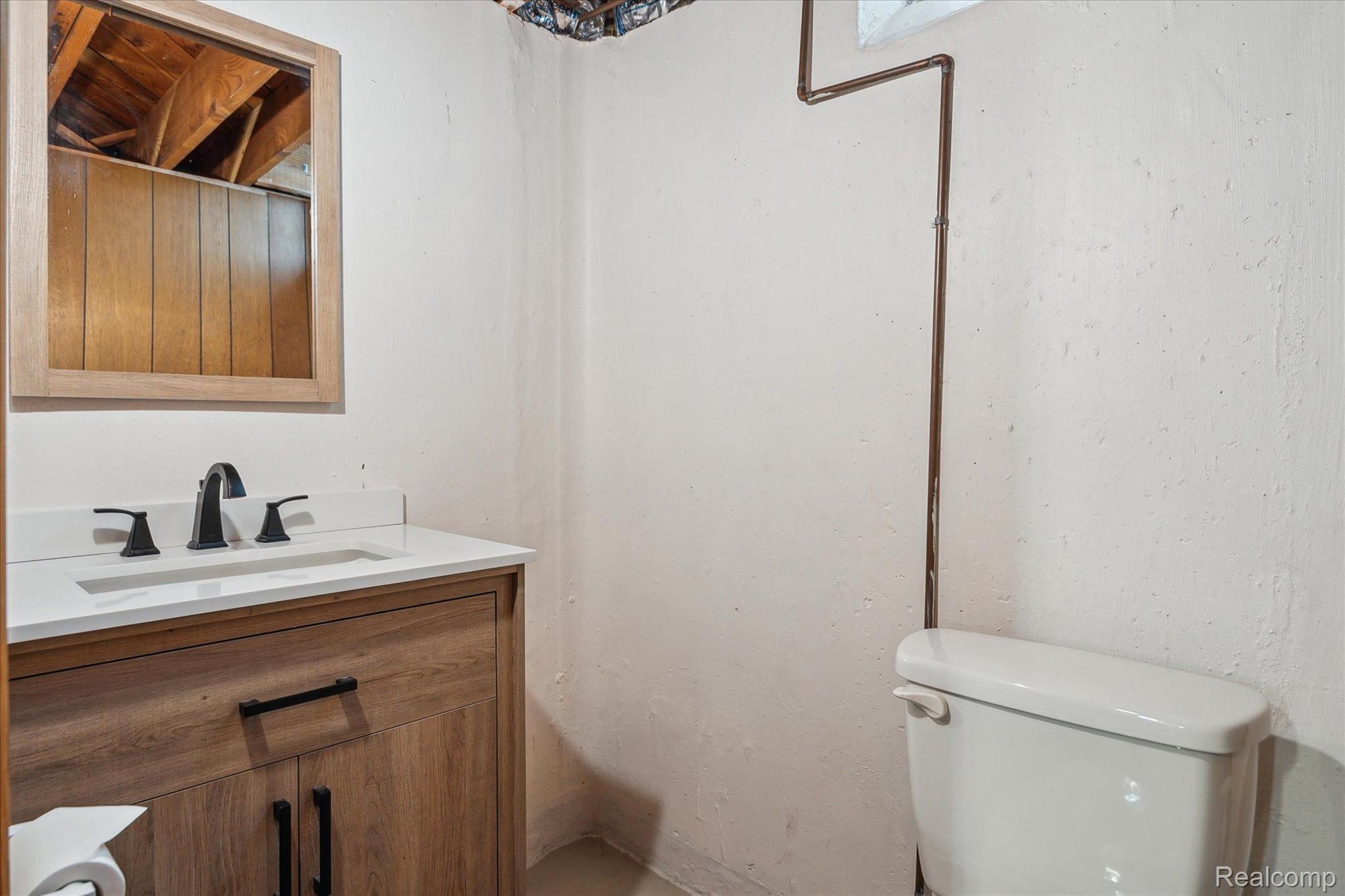 3062 Grange Road Trenton, MI 48183 - Photo 58 of 65 HALF BATHROOM/BASEMENT