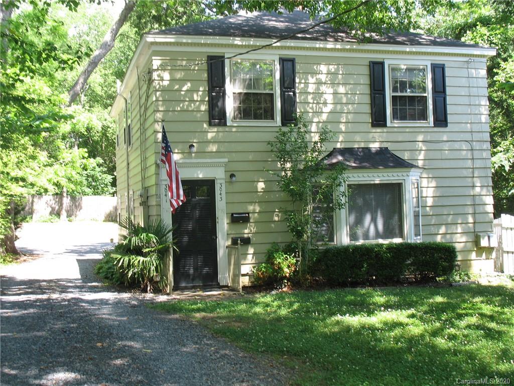 3043 Park Road Charlotte, NC 28209 - Photo 1 of 9 a front view of a house with garden
