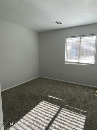 a view of a livingroom with a rug