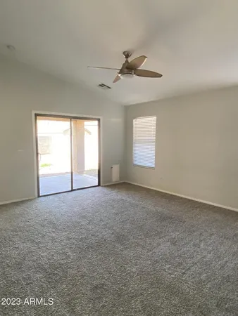 a view of empty room with windows