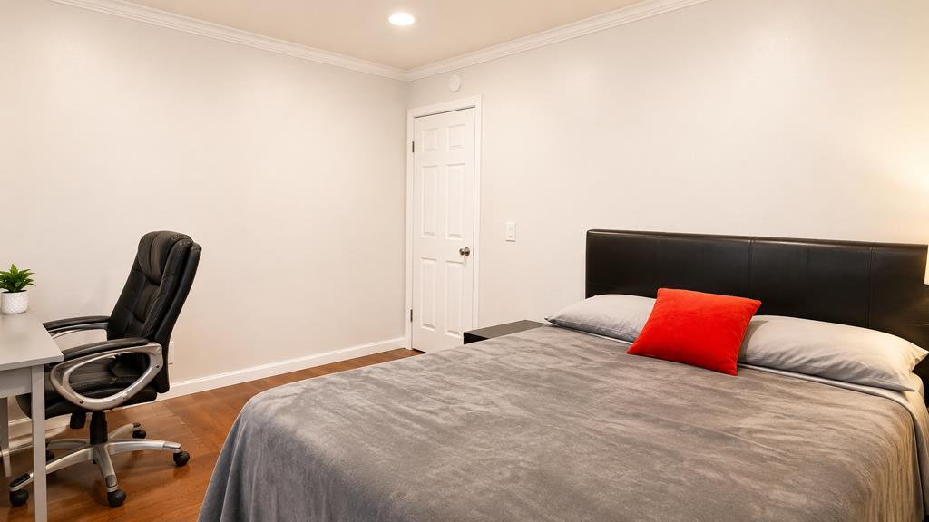 1281 Traynor Road Concord, CA 94520 - Photo 18 of 41 a bedroom with a bed and chair