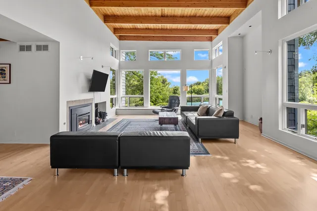 a living room with furniture and a table
