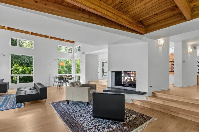 a view of a room with furniture and a window