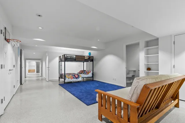 a utility room with sink dryer and washer