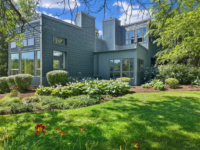 a view of a house with a garden