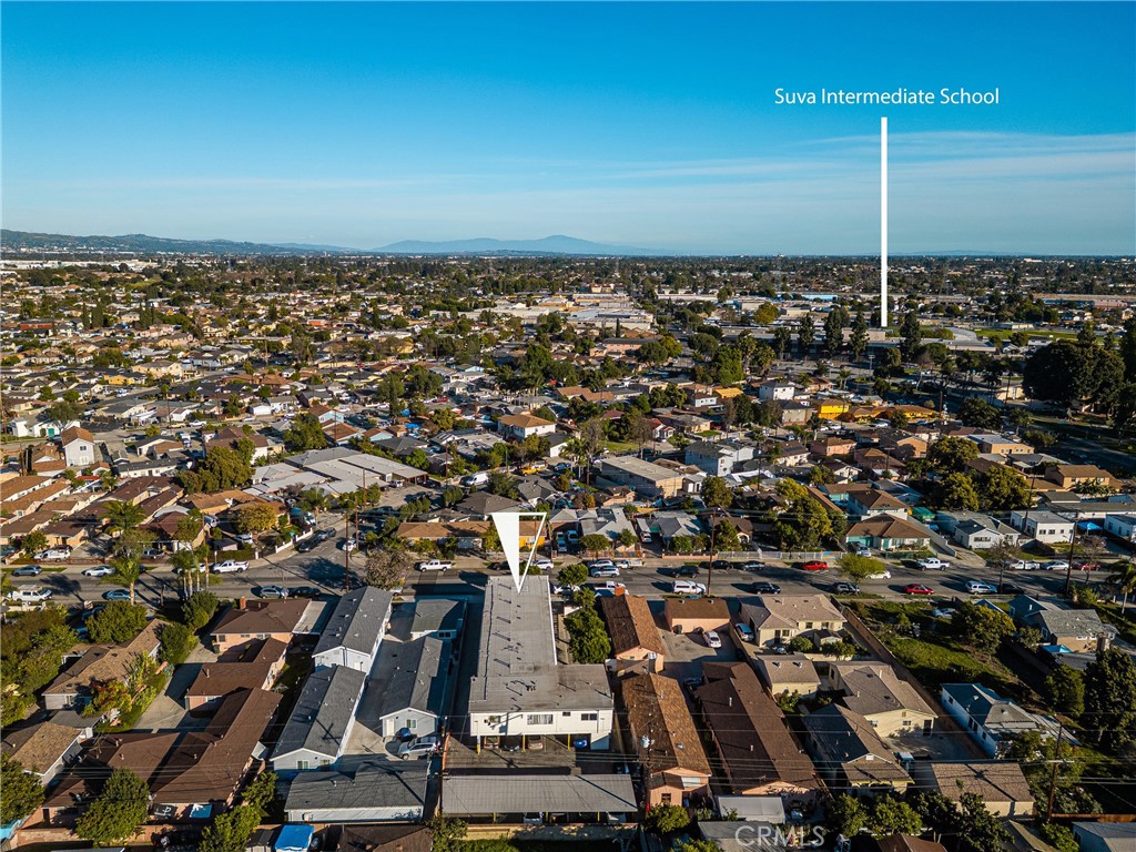 6725 Perry Road Bell Gardens, CA 90201 - Photo 37 of 40 an aerial view of a city