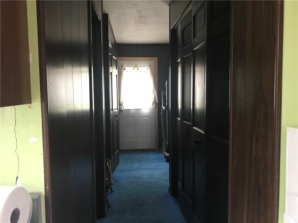 211 Forest Hills Road Pittsburgh, PA 15221 - Photo 6 of 12 Long hallway that leads from front door to back door.