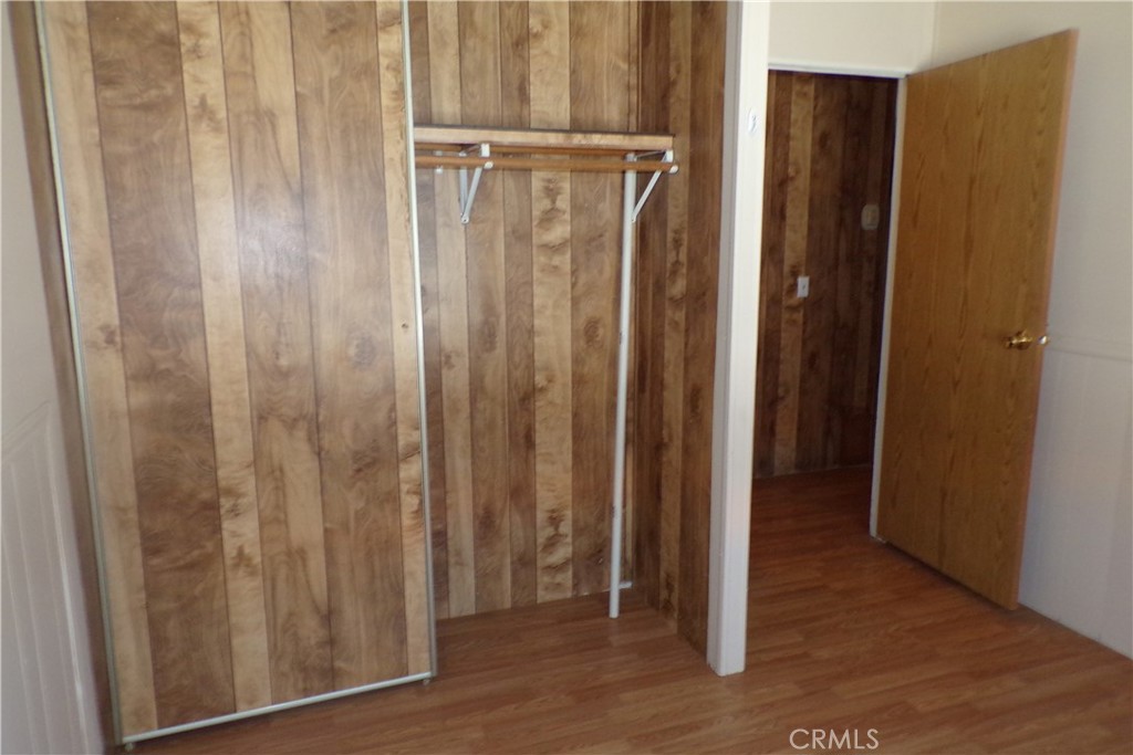 34447 Yucaipa Boulevard, Unit 2 Yucaipa, CA 92399 - Photo 7 of 16 a view of a bathroom with wooden floor