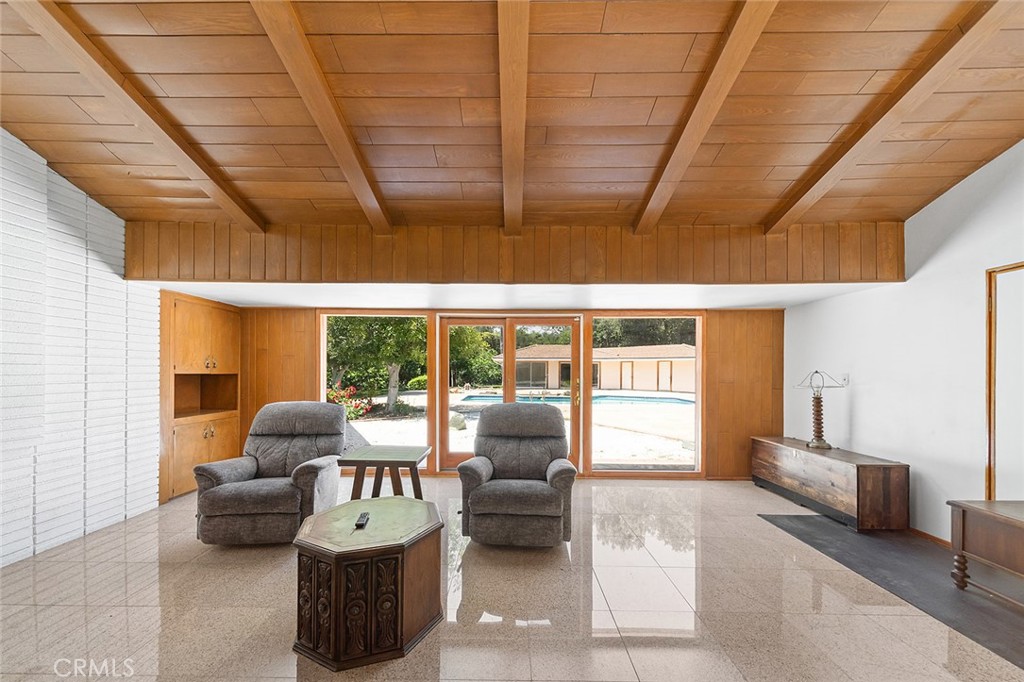 20827 East Mesarica Road Covina, CA 91724 - Photo 12 of 40 a living room with furniture and large windows