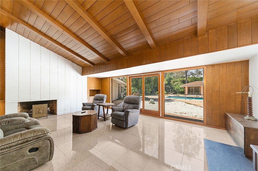 20827 East Mesarica Road Covina, CA 91724 - Photo 13 of 40 a living room with furniture large window and flat screen tv