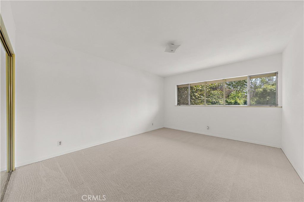 20827 East Mesarica Road Covina, CA 91724 - Photo 21 of 40 an empty room with a window