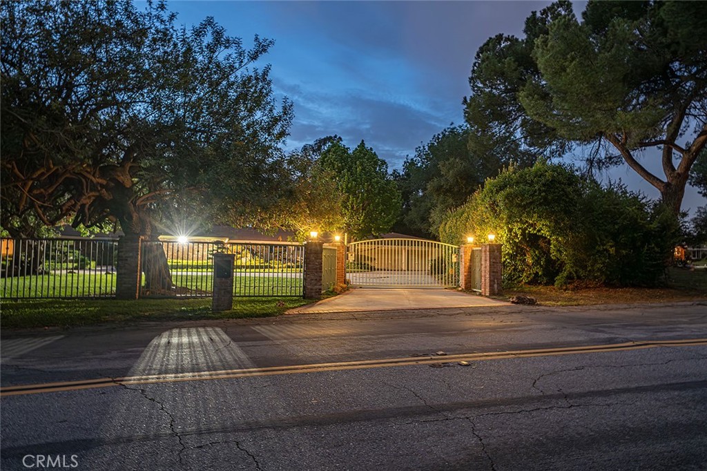 20827 East Mesarica Road Covina, CA 91724 - Photo 37 of 40 a front view of a house with yard