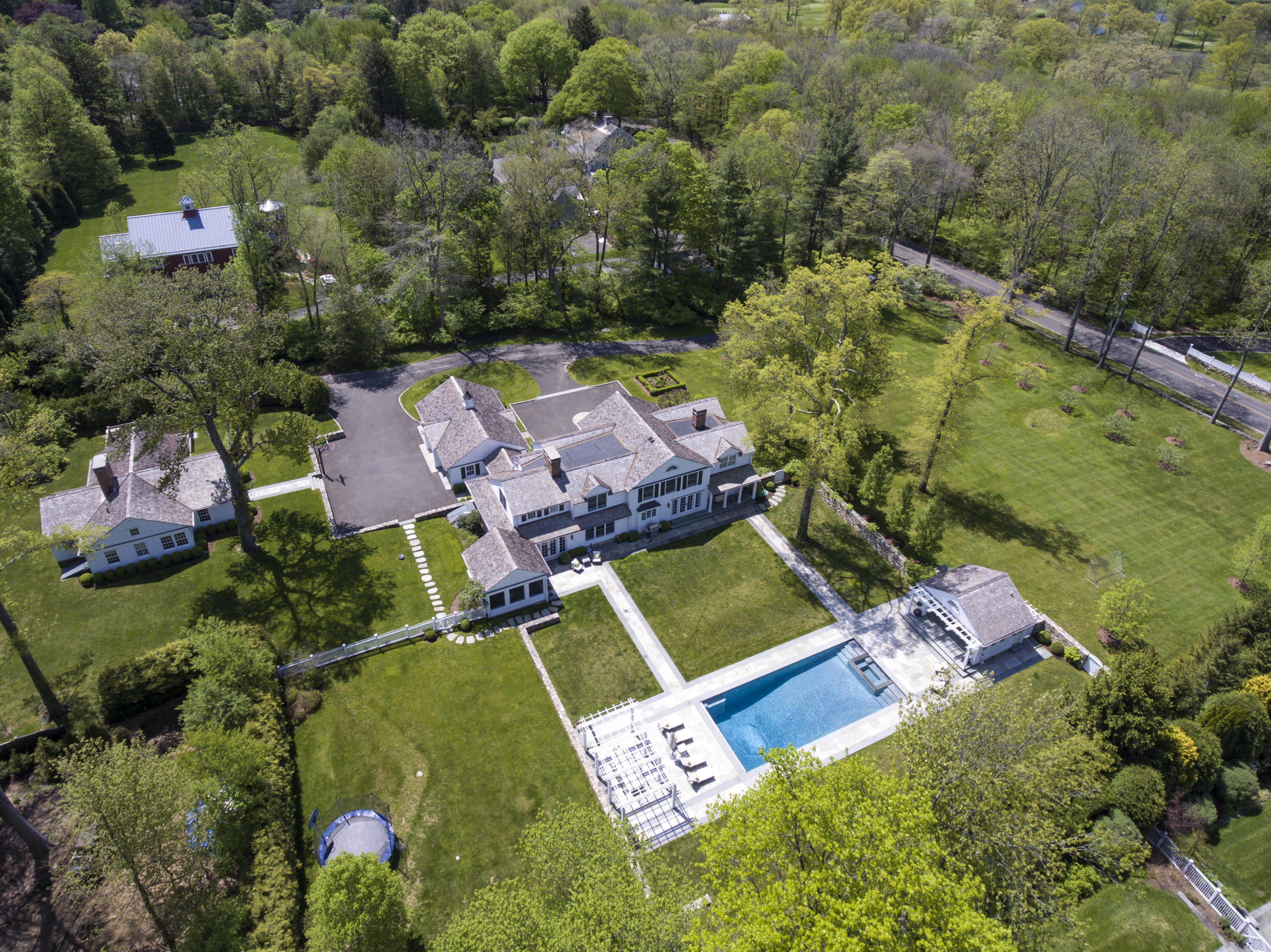 an aerial view of house with a yard