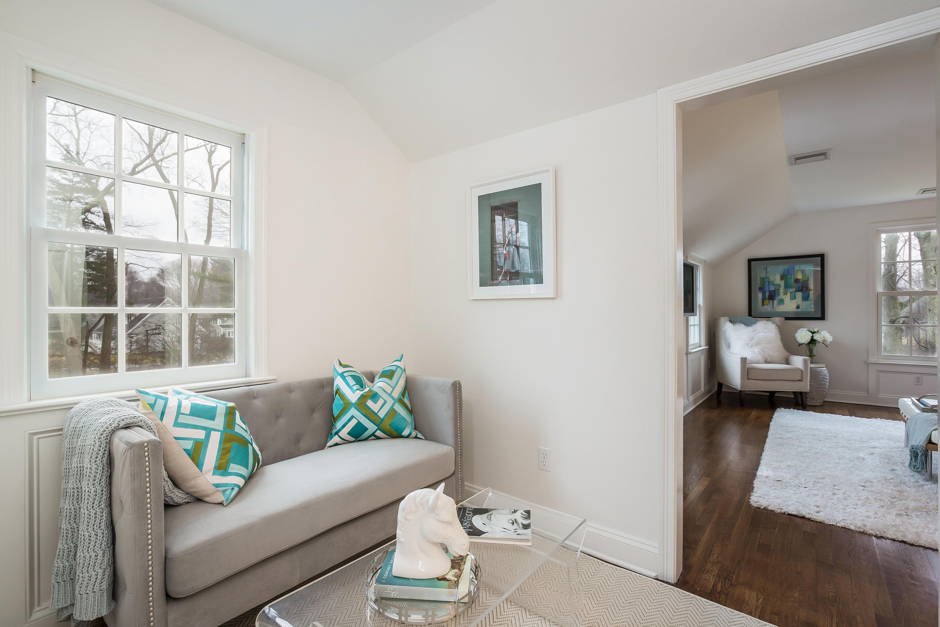 256 Brookside Road Darien, CT 06820 - Photo 27 of 66 a living room with furniture and a window