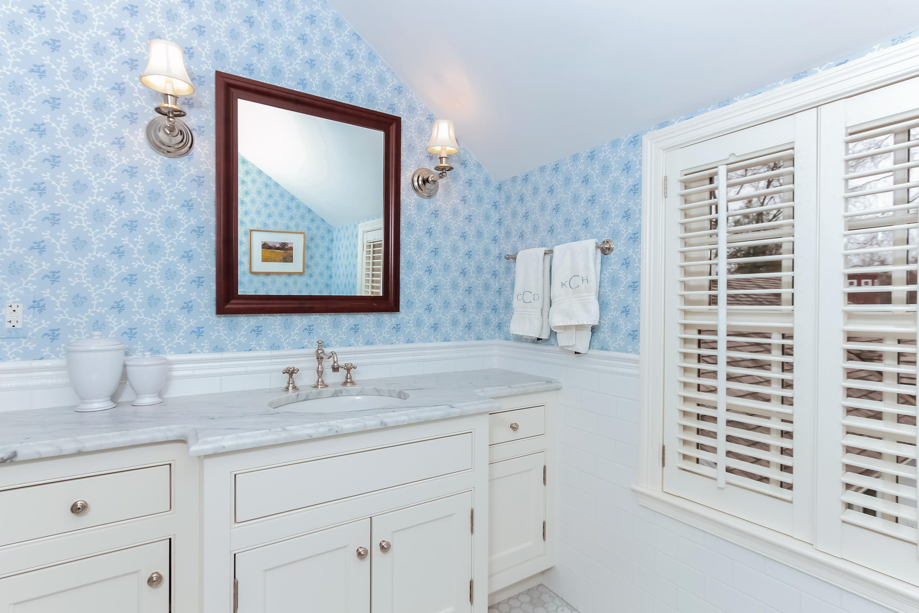 256 Brookside Road Darien, CT 06820 - Photo 32 of 66 a bathroom with a sink and a mirror