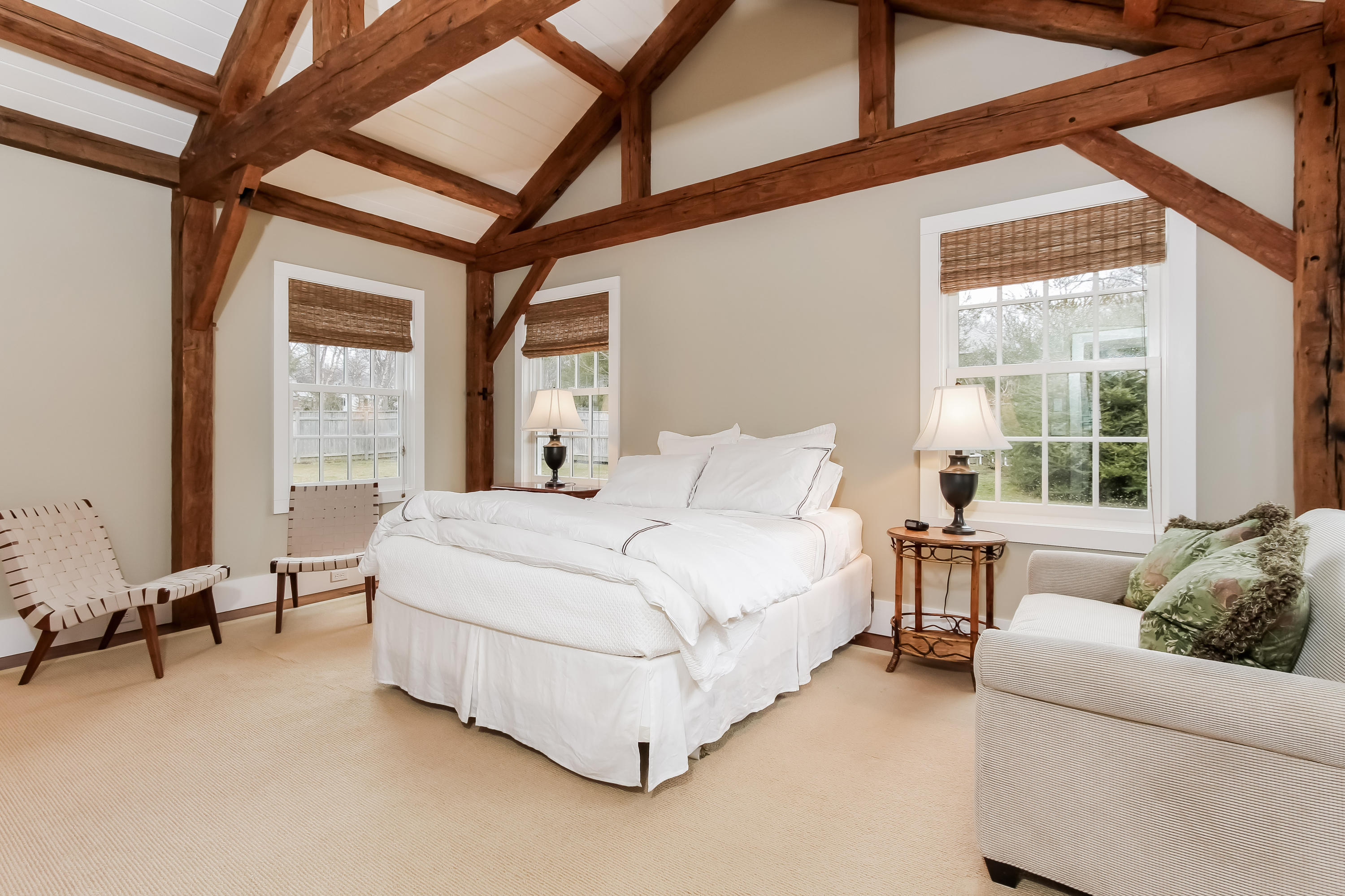 256 Brookside Road Darien, CT 06820 - Photo 47 of 66 a bedroom with a bed couch and windows