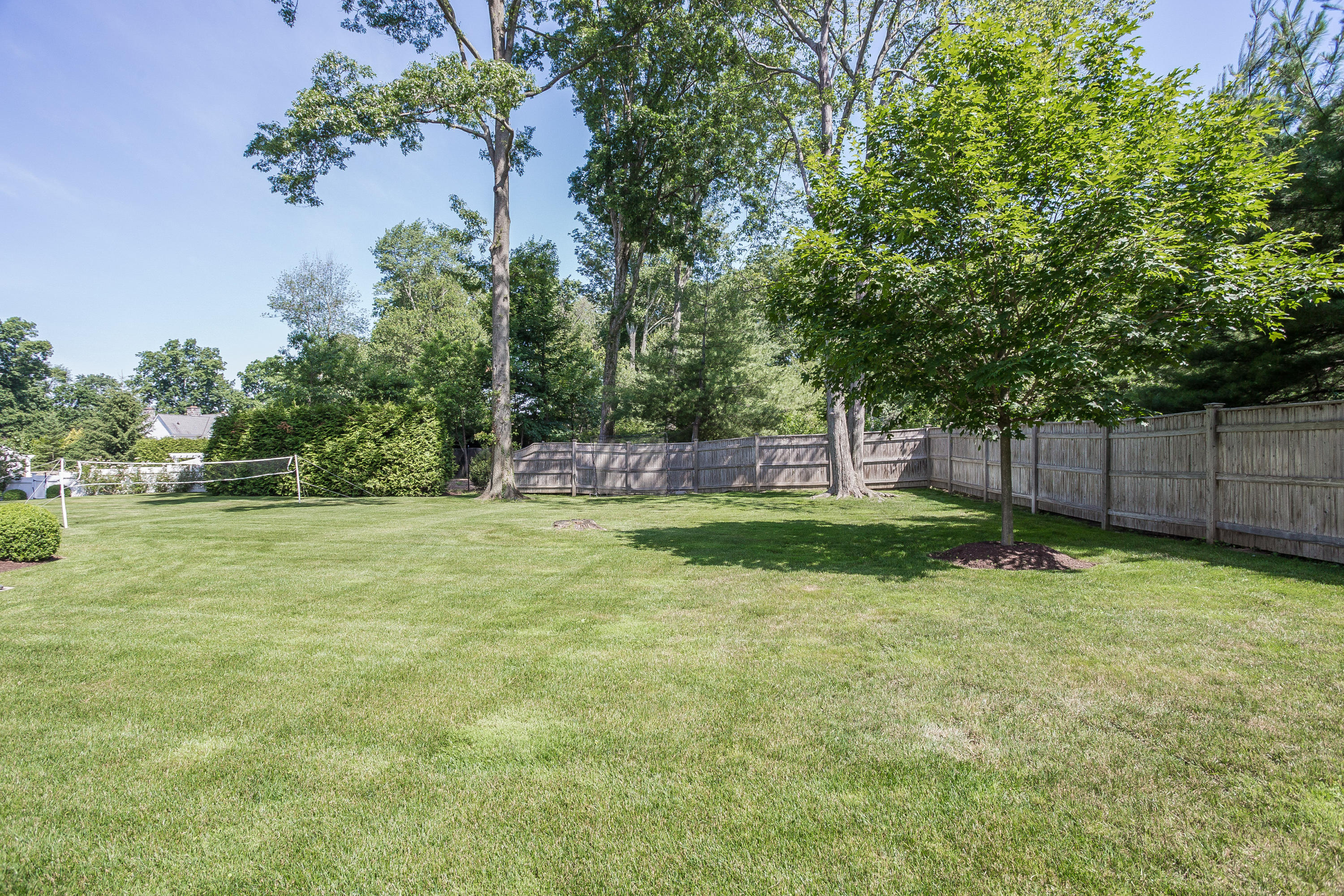 256 Brookside Road Darien, CT 06820 - Photo 61 of 66 a view of yard with swimming pool and trees