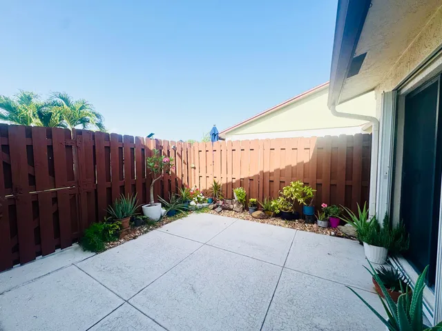 a view of a potted plants in front of a door