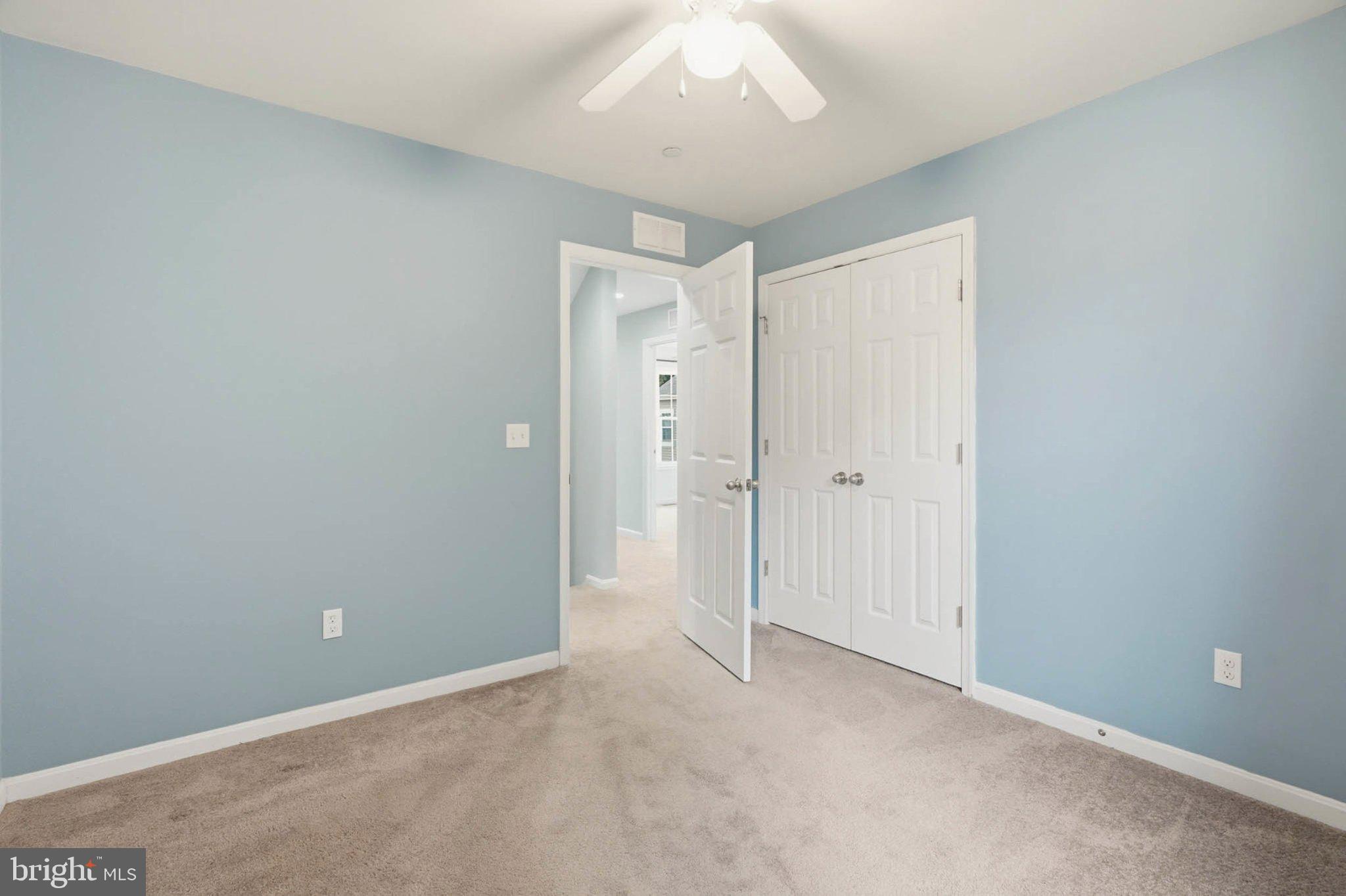 706 Trapper Way Deale, MD 20751 - Photo 37 of 61 Serene blue walls invite tranquility.
