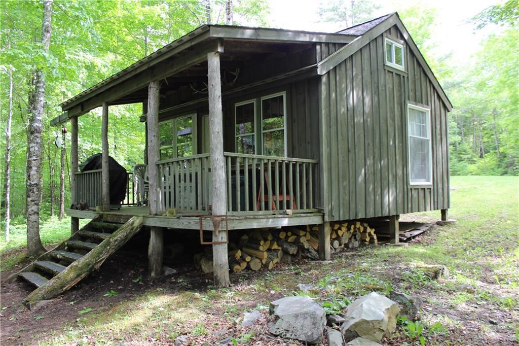 1 York Mill Athens, ME 04912 - Photo 1 of 23 Left side view of cabin. Well built...