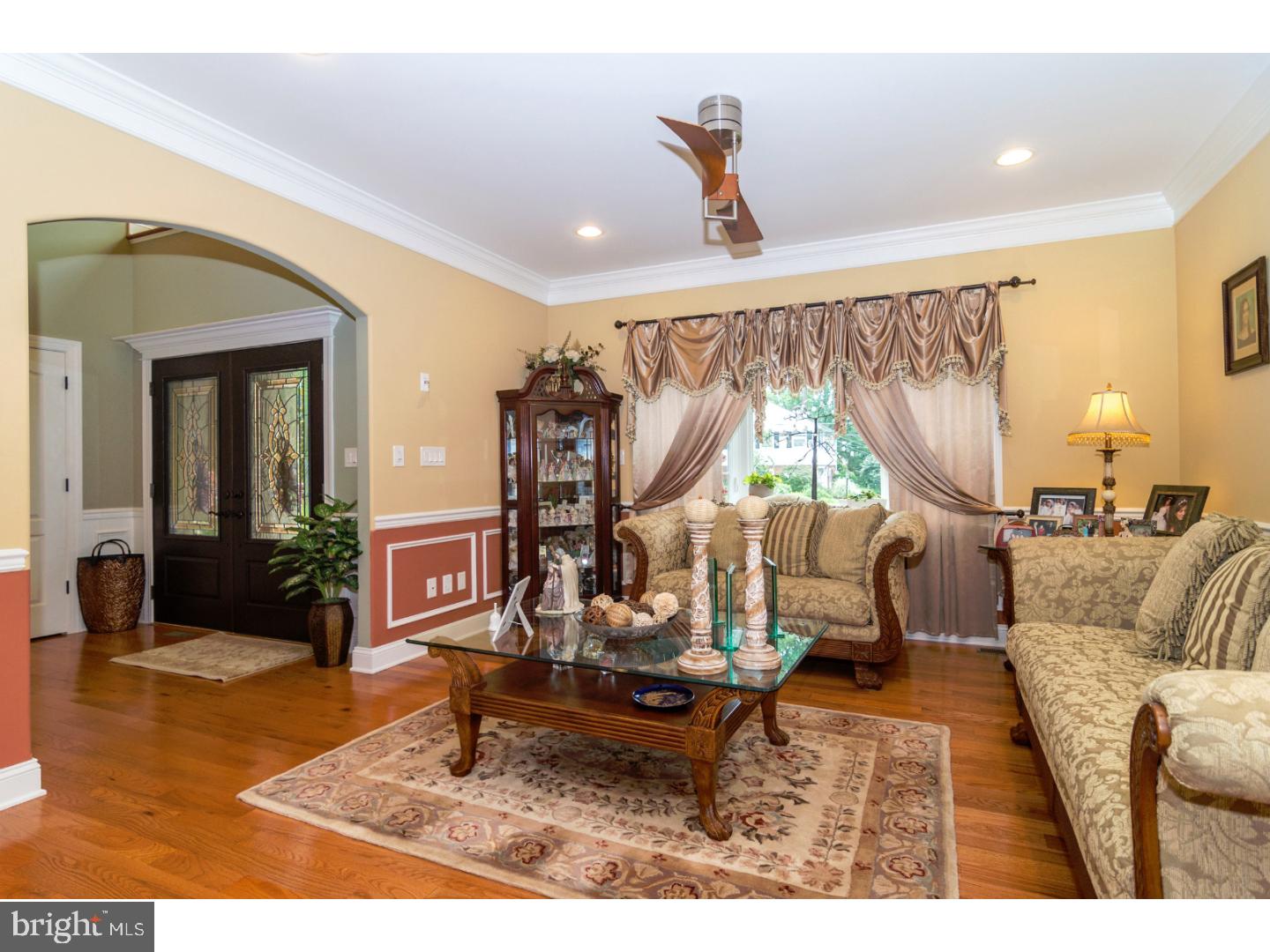 241 Shoemaker Road Huntingdon Valley, PA 19006 - Photo 5 of 25 a living room with furniture and a flat screen tv