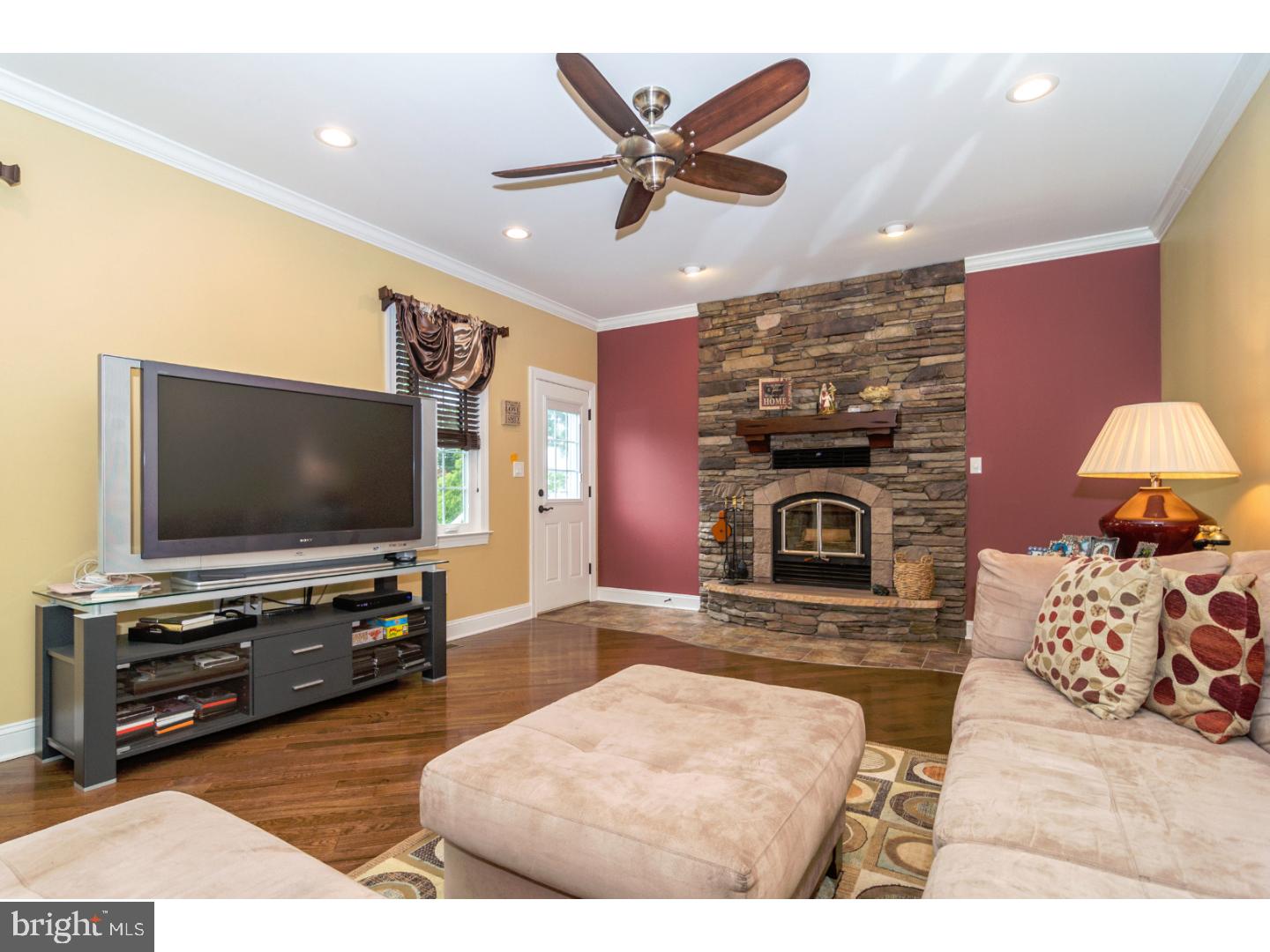 241 Shoemaker Road Huntingdon Valley, PA 19006 - Photo 9 of 25 a living room with furniture and a flat screen tv