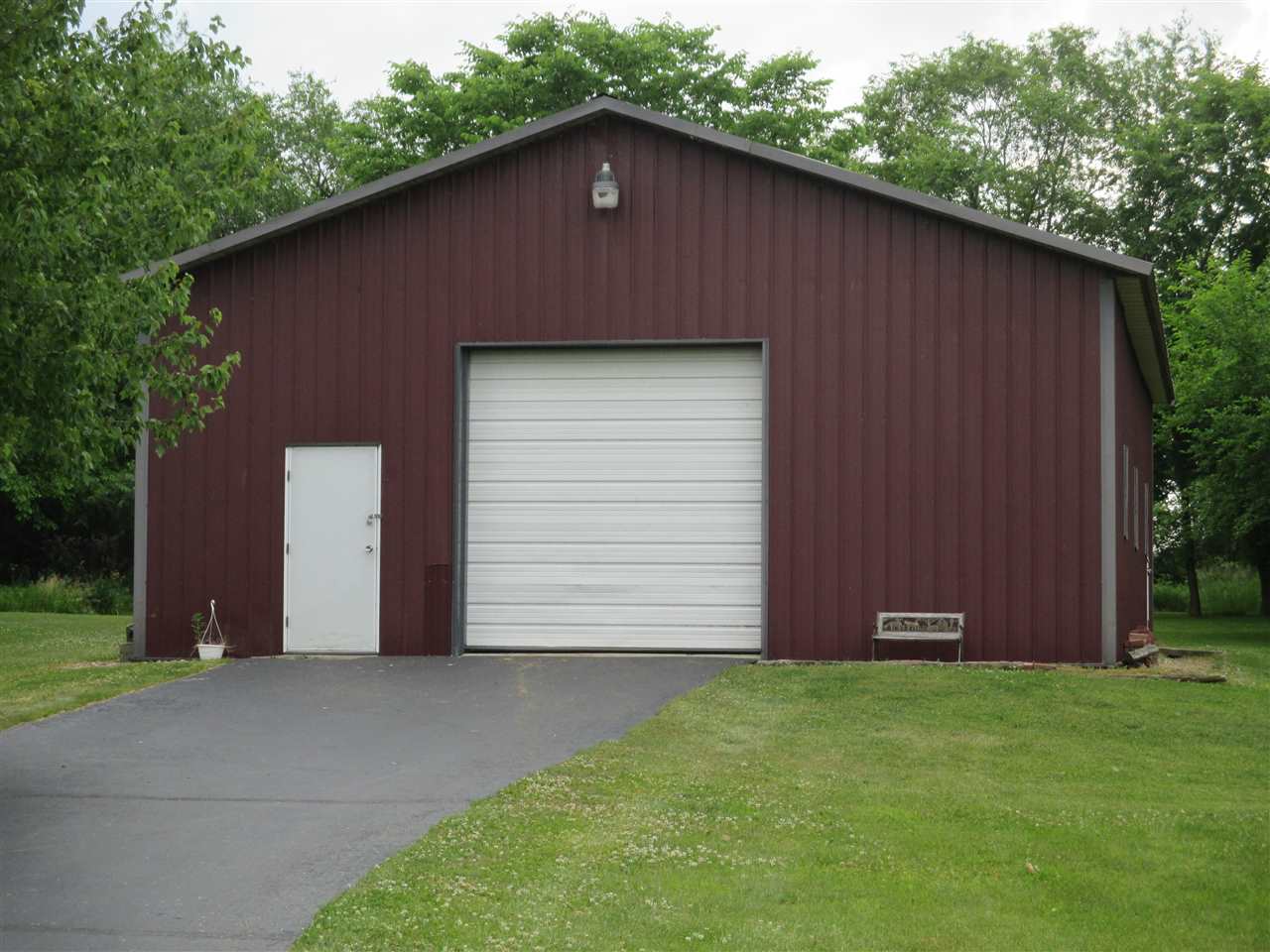 6265 North River Road Byron, IL 61010 - Photo 29 of 37 a backyard of a house with lots of green space