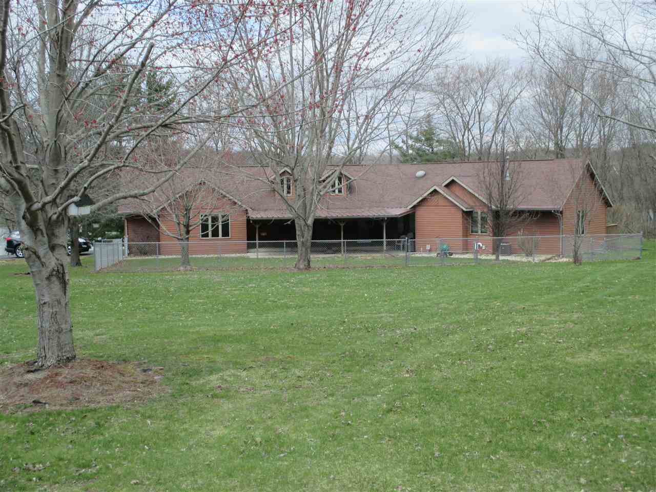 6265 North River Road Byron, IL 61010 - Photo 4 of 37 a view of a house with a yard