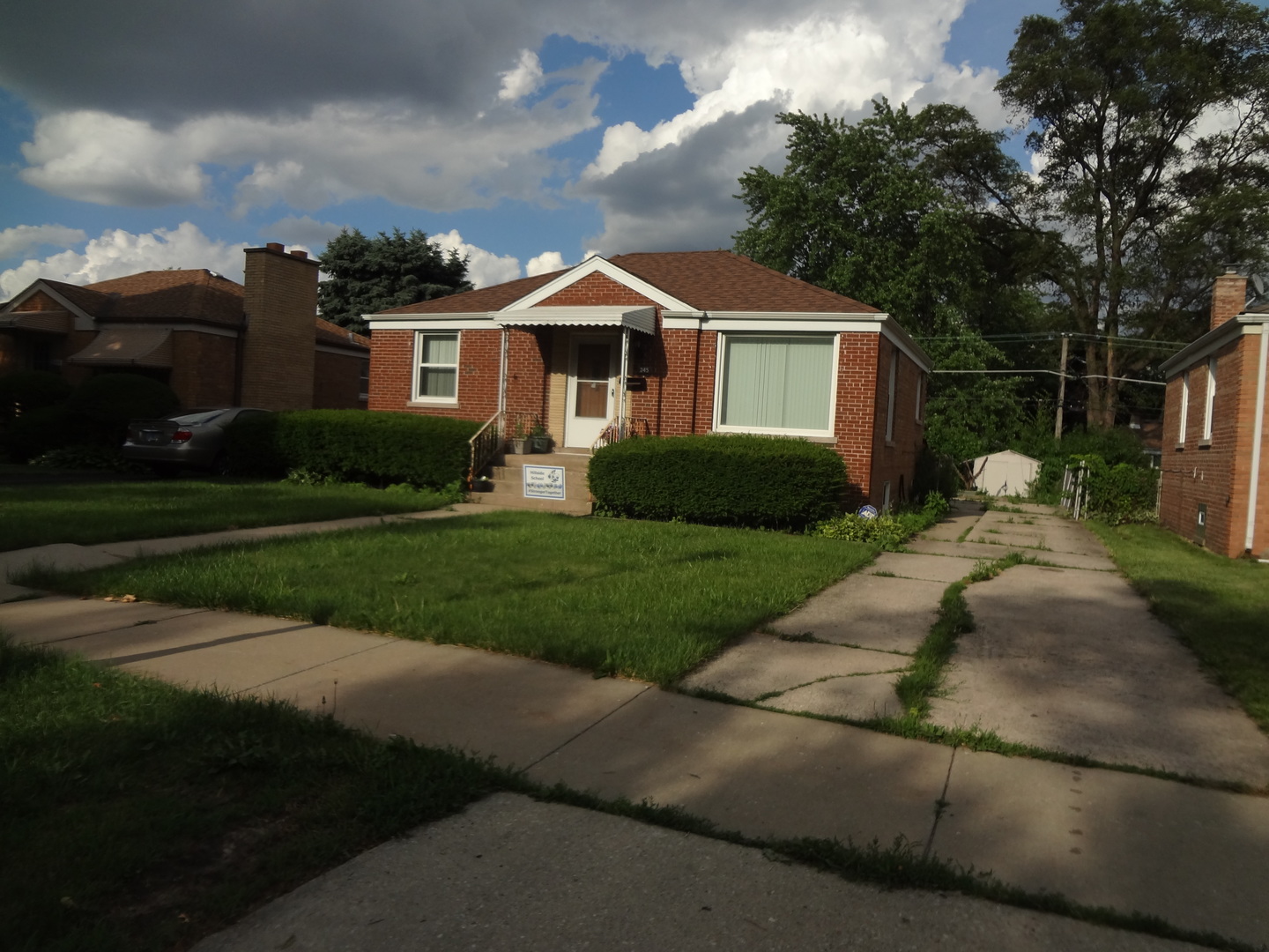 245 North Wolf Road Hillside, IL 60162 - Photo 21 of 21 a front view of a house with a yard