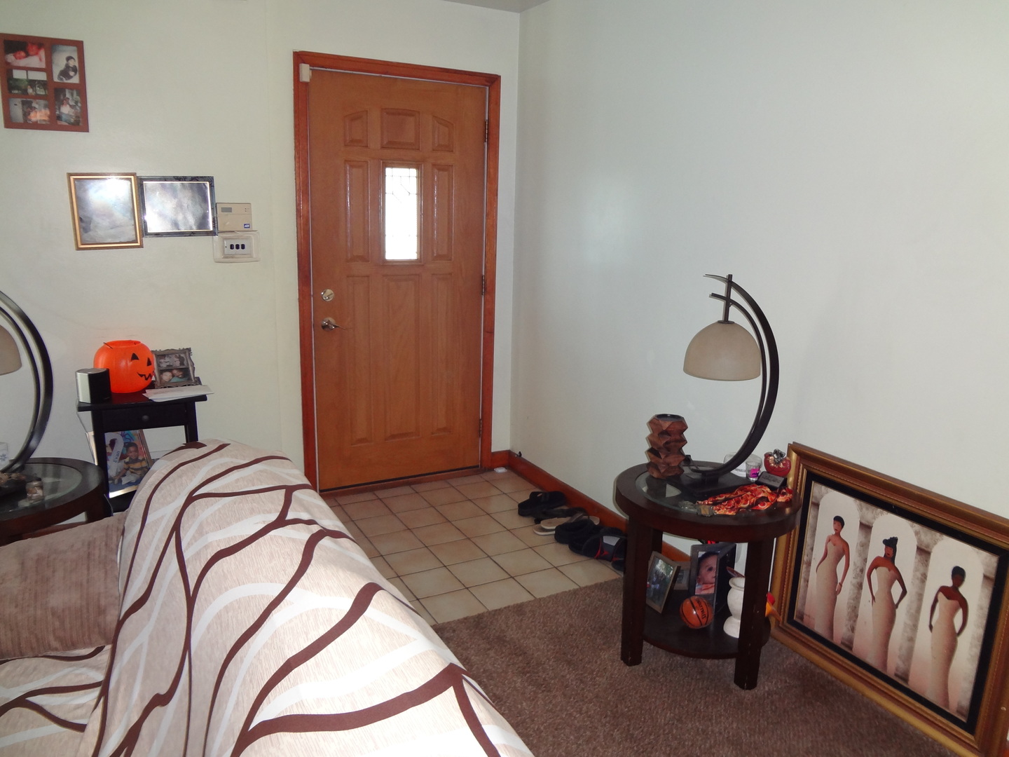 245 North Wolf Road Hillside, IL 60162 - Photo 4 of 21 a room with chandelier fan and wooden floor