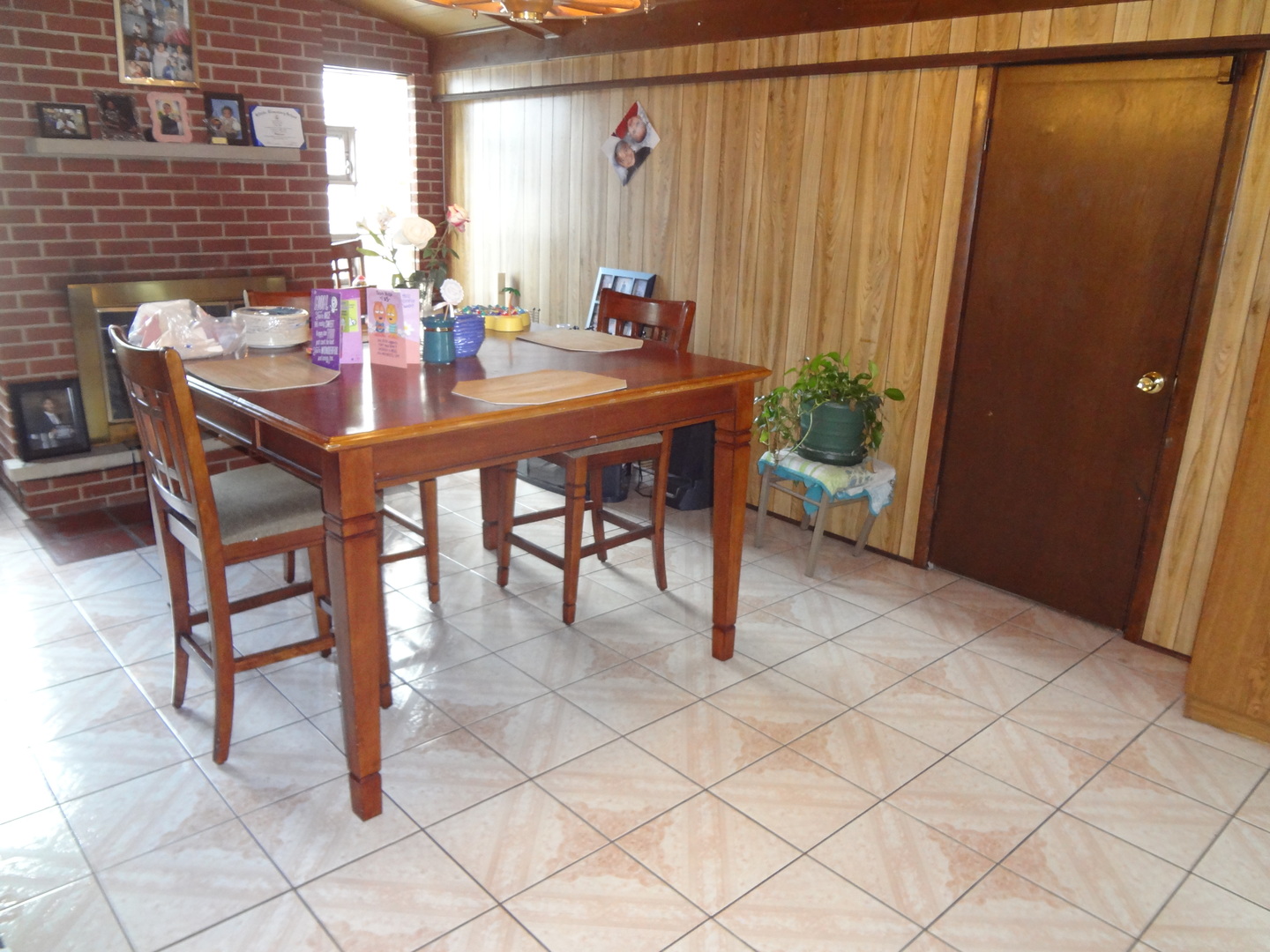 245 North Wolf Road Hillside, IL 60162 - Photo 5 of 21 a dining room with furniture and a window