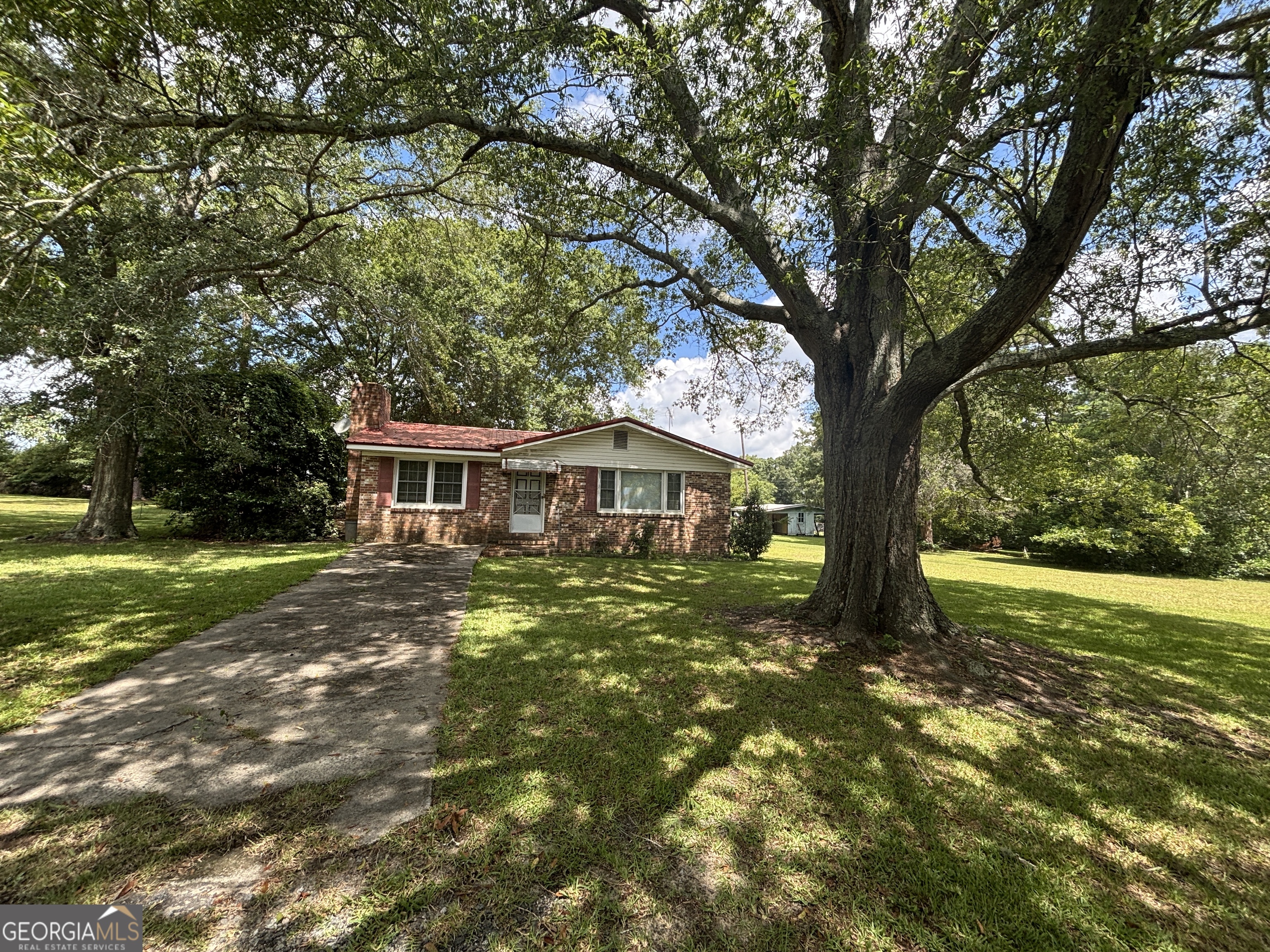 105 Larryton Drive Cochran, GA 31014 - Photo 1 of 1 a view of a house with a yard