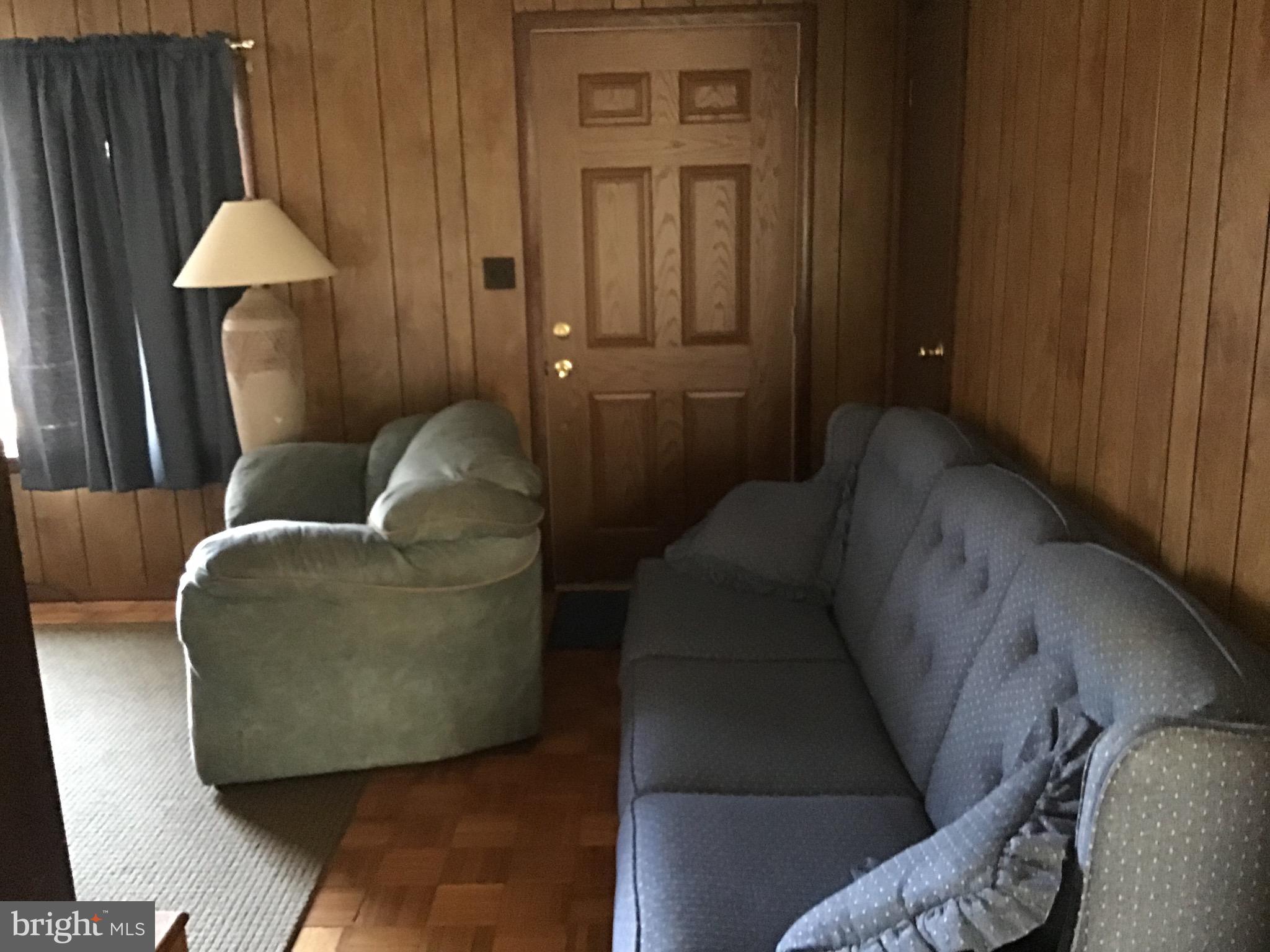 34505 Vandyke Road Galena, MD 21635 - Photo 20 of 55 a living room with furniture and a window