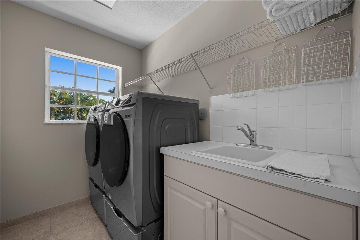 429 Oriole Circle Jupiter, FL 33458 - Photo 25 of 57 upstairs laundry room