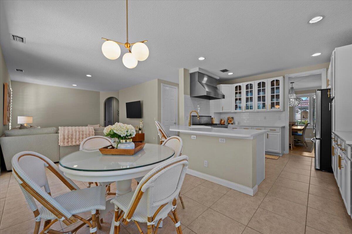 429 Oriole Circle Jupiter, FL 33458 - Photo 8 of 57 dining room, kitchen, living room