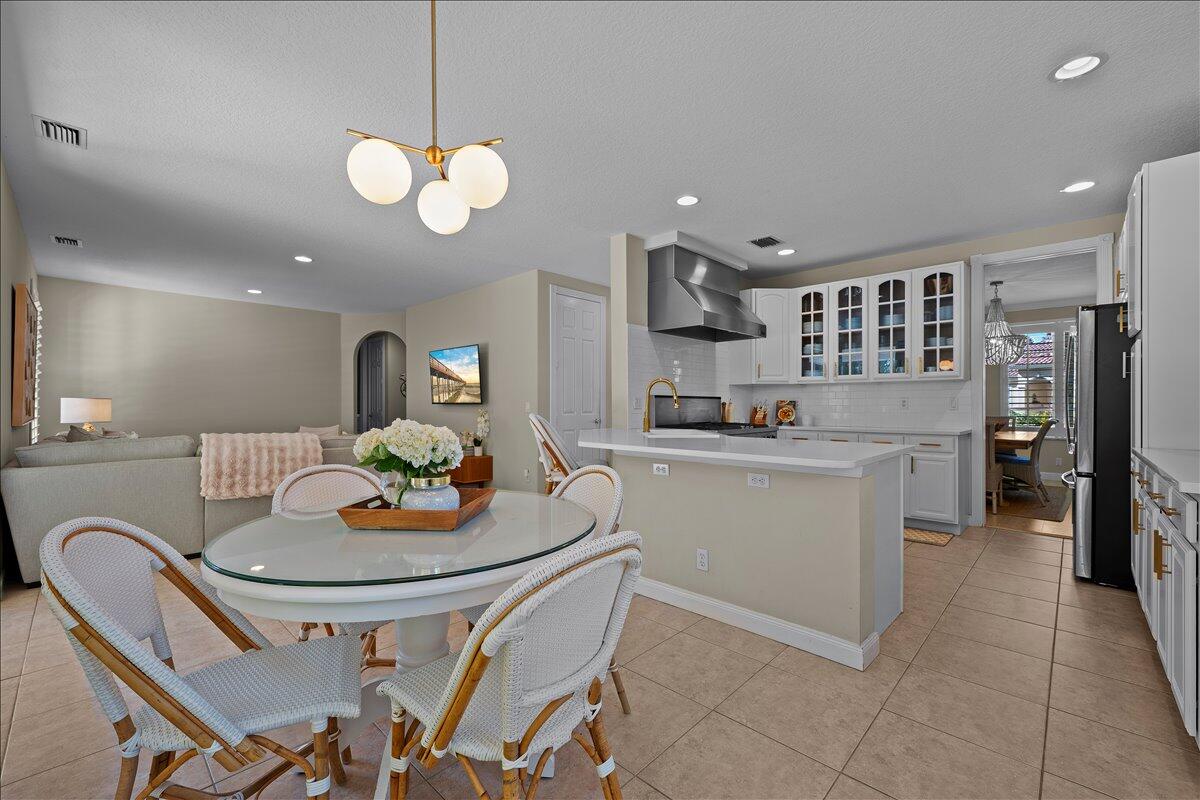 429 Oriole Circle Jupiter, FL 33458 - Photo 9 of 57 dining room facing kitchen
