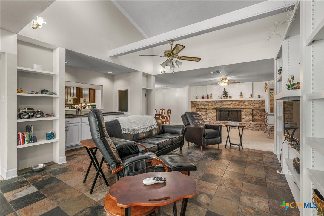 2007 O'Kelley Road Rockdale, TX 76567 - Photo 12 of 40 a work room with furniture and a kitchen view