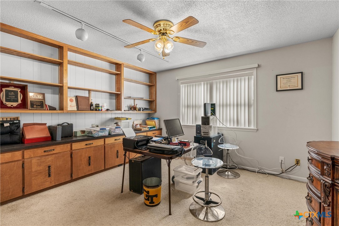2007 O'Kelley Road Rockdale, TX 76567 - Photo 29 of 40 a view of a workspace with furniture and a window